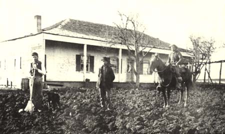 Boronda Adobe about 1887. Pictured are some of the family of William Anderson and Ines Boronda de Anderson, daughter of Eusebio. Courtesy of Monterey County Historical Society. 