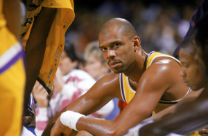 1987: Kareem Abdul-Jabbar #33 of the Los Angeles Lakers sits on the bench during an NBA game at the Great Western Forum in Los Angeles.