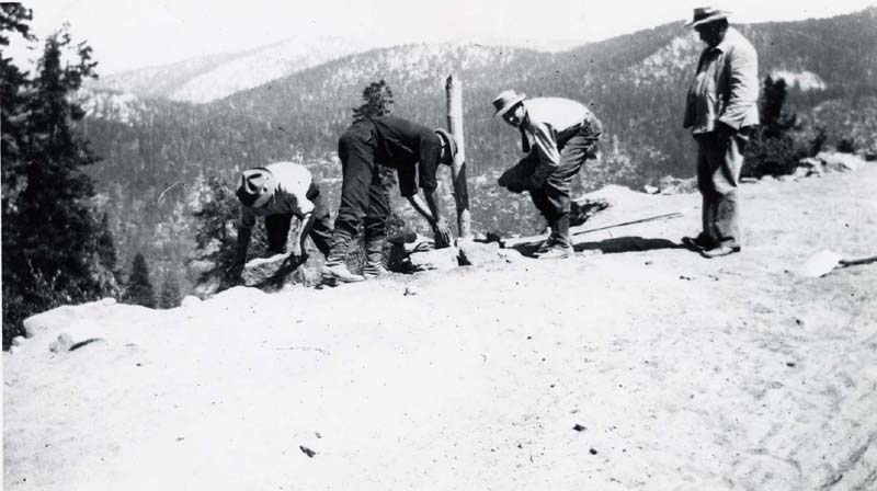 Road survey party at work on California’s first state highway, 1907. Future Secretary of State Frank M. Jordan is to the right of the post, facing the camera. Photographs, Records of the Department of Public Works, Division of Highways, California State Archives.