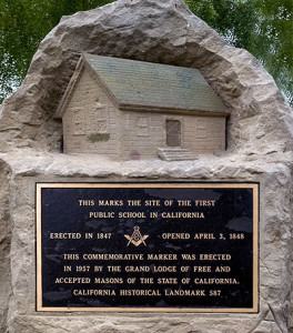 Historical marker for the first public school in California.