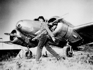 Amelia Earhart and her Lockheed Electra (circa 1937).