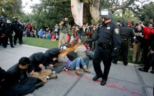 John Pike pepper-spraying student protestors (2011).